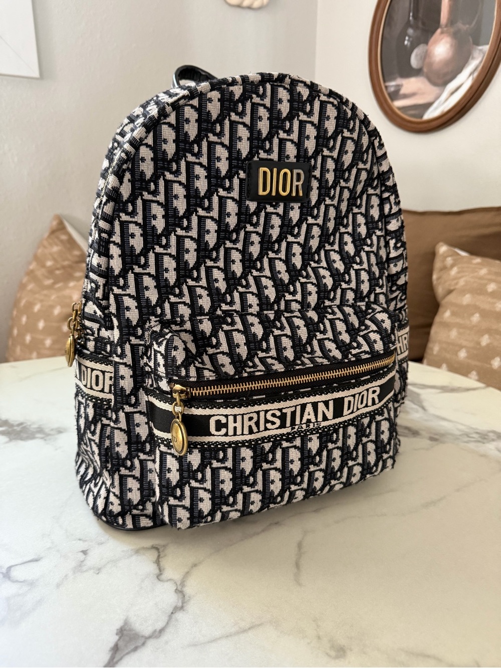 Black & White Oblique Mini Backpack with Gold Hardware